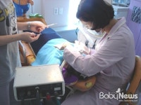 부산 오즈의원, 소외아동 위해 치과진료 지원