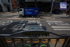 어린이보호구역 내 불법 주·정차 차량 신고 시 과태료 8만 원 부과