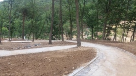 한림로덱스, 공주산림휴양마을에 보도블록 무상 제공