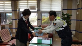 백운1동자율방범대, 저소득층 학생 후원