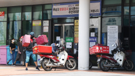 배달 오토바이 느는데···절반 이상 무보험