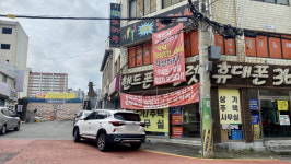 재건축 강행, 버티는 상가 가시 돋친 장미아파트
