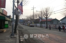 교현안림동 주민센터, 만국기 교체