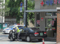 아산병원 호객 약국 약사 20명, 운전자 40명 불구속 입건