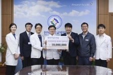 희성산업 유태호 대표, 전북대병원에 발전기금 1000만원 전달