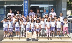 고사리손으로 전한 폐건전지와 우유팩