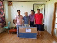 아산시 인주면 청년회, 화재가구에 TV 전달