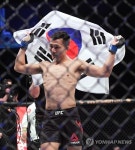 [UFC 부산] 정찬성, 완벽한 경기력으로 에드가잡고 역사적인 KO승