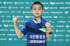11세 탁구신동 이승수 목표는 항상 1등...형들 대회서 동메달