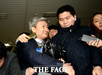 [TF포토] 여유 넘치는 미소…특검 출석하는 임대기 제일기획 사장