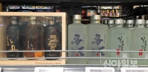 ‘프리미엄 소주’ 돌풍…화요·일품진로·대장부 자존심 경쟁