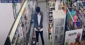 멀쩡한 길 놔두고 도로 난간 넘고, 편의점서 노마스크로 담뱃불 붙인 CCTV 속 이 사람은 그룹 신화의 신혜성이다