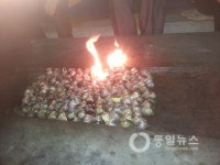중 신화통신, 북한 미식 휘발유 조개구이 소개