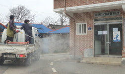 코로나19 방역 나선 전농 회원들