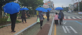 사천시 양산쓰기로 '무더위·폭염' 극복한다