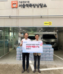 하이트진로, 쪽방촌 거주민에 석수 6만4000병 제공