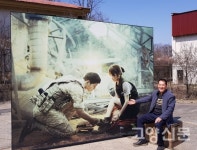 독수리 먹이주며  DMZ 관광농원 꿈도 키워