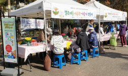 정발산동 주민자치회, 쓸어담고 소통하다