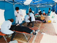 부산대 치의학전문대학원 학생들, 학생들에게 무료 구강검진 봉사