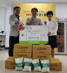 광명교회 성도 용담1동 주민센터에 쌀 기부