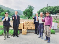 대한노인회 충북 충주시지회, 공동 작업으로 수확한 감자를 나눠