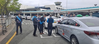 김해국제공항 택시승차장 선진교통 기초질서지키기 합동 캠페인 실시