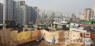 아현동 699 재개발 주민 찬성…복잡한 지분율 등 숙제 남아