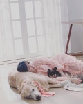 구혜선 속 구혜선은 자신의 반려견들과 함께 누워있는 모습이다
