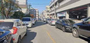 ˝공영주차장 지었더니˝... 불법 주차 차량으로 둘러싸여