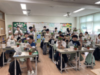 대구 범물2동 우리마을교육나눔추진위, 범일초 학생들과 일일초 화분 나눔