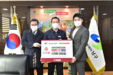 (주)디엔케이 인터내셔널, 마스크 10만장 기탁