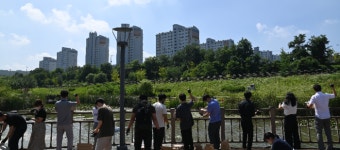 화성도시공사, 저류지 수질 복원 EM흙공 던지기 행사