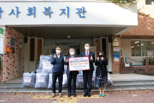 BNK투자증권, 울산 남구종합사회복지관 침구 전달