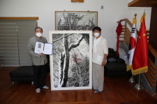 정상기 사진작가, 한라산 붉은 겨우살이 작품 한·중 문화 교류에 큰 역할