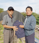 충주축협, 전 조합원에게 방한복 전달