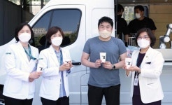 로봇 바리스타가 무료로 제공하는 커피 “이화의료원 의료진 힘내세요”
