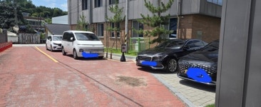 [포토뉴스]장수군 단속뒷전 "불법 주차"기승 … 장수군의원들차까지