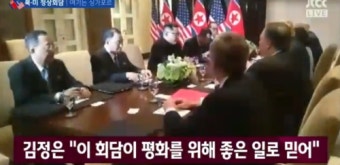 김정은, 바로 손잡을 수 있는 거리에서... '끄덕이며 예우' , 굳은 악수를