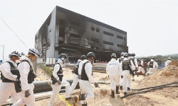 Warehouse fire shatters Korean dream