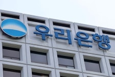 [실물이전 1년 점검] [우리은행] 아쉬운 현재, 전망은 맑음…‘종금 완성’ 시너지 기대