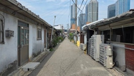 [르포] 폭염보다 뜨거운 표심 싸움…용산1구역은 조용한 전쟁 중