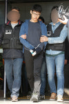 인상 찌푸리는 PC방 살인사건 피의자 김성수 씨[포토]