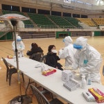 양산실내체육관에 현장 선별진료소 설치해 일제검사