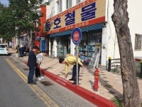 소화전 앞 주‧정차 금지를 위한 적색노면표시 설치 완료