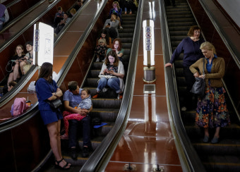 Russian Missile and Drone Attacks on Kyiv Send Civilians Racing for Cover