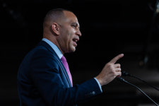 Democrats reeling from Trump’s moves plot how to mount an effective resistance.