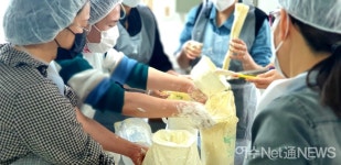 나눔냉장고 가득채우는 낭만로타리클럽