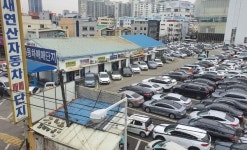 [이슈]GS건설 덮어놓고 방빼···부산 새연산중고차매매단지 차량 900대 넘어...어쩌라고
