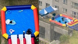 아파트 단지 1층 공용 공간에 ‘에어 바운스’ 설치한 가족