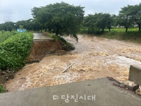 물폭탄에 논 잠기고 도로 끊기고